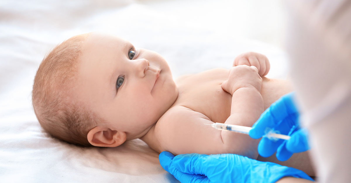 Doctor vaccinating baby in clinic; blog: Why Are Infant Immunizations Important?