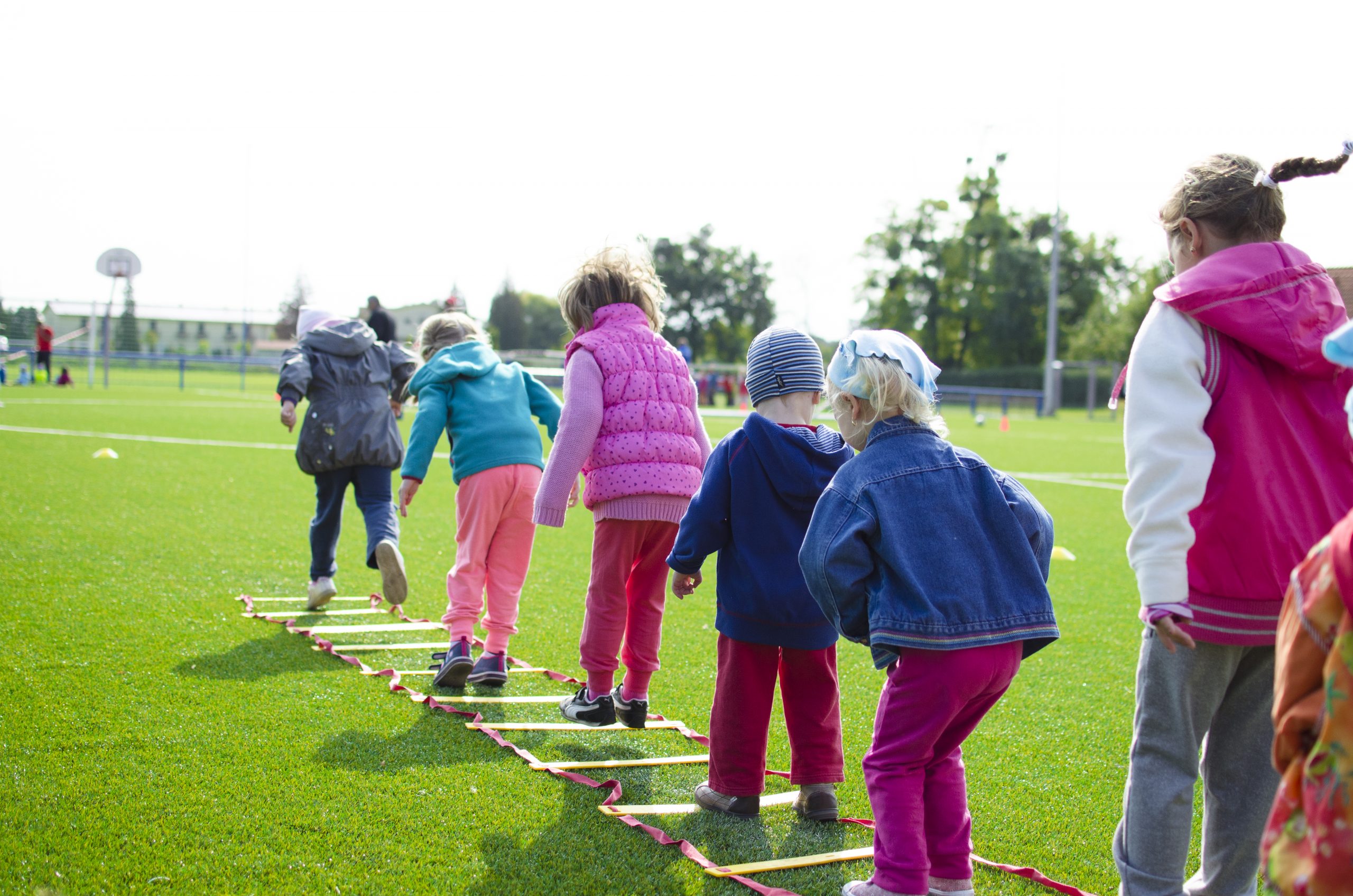 Kids together in jumping competition HealthPark Pediatrics Children's Health Month