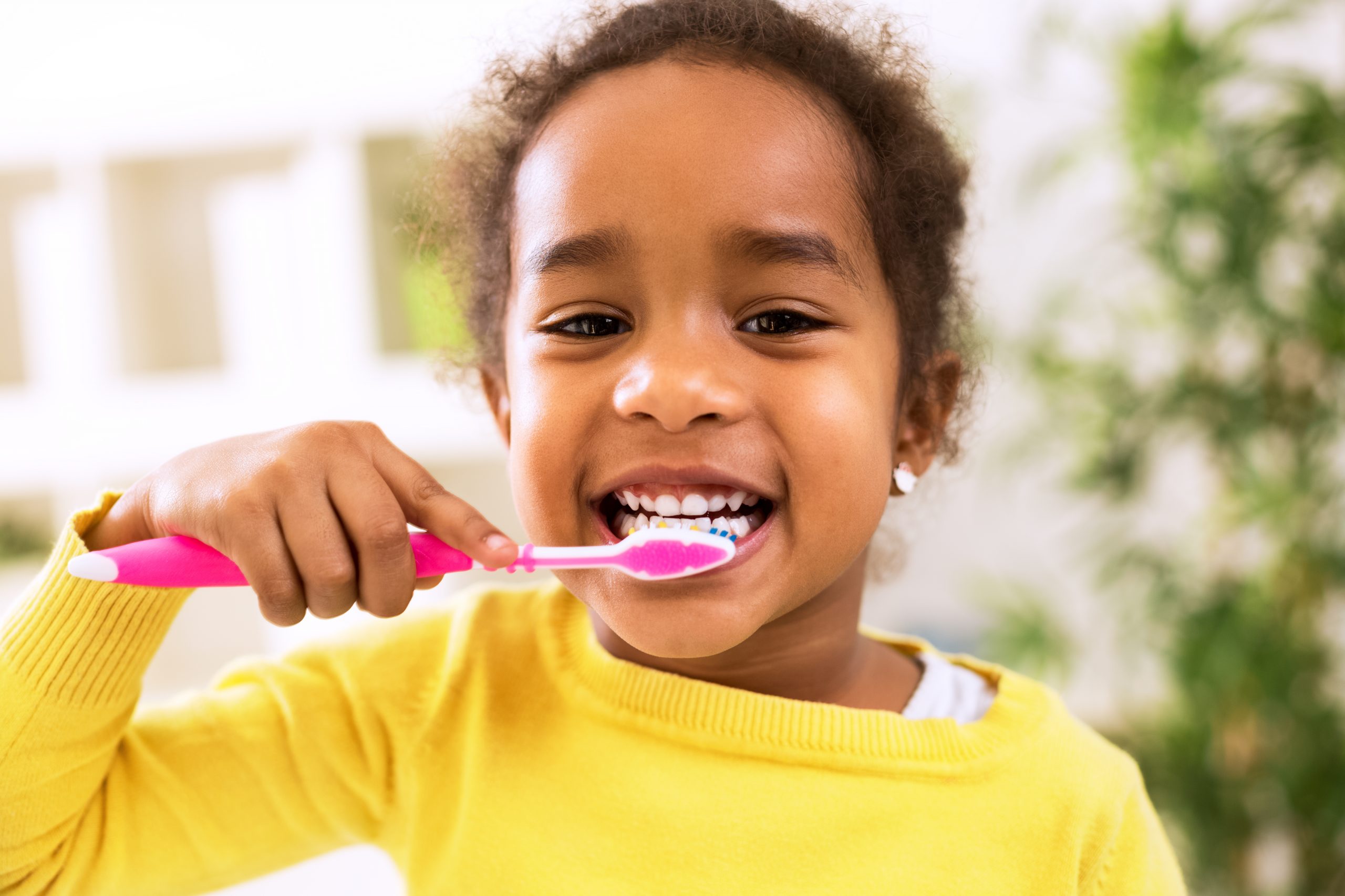 Little beautiful girl brushing teeth, healthy concept